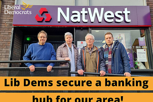 Lib Dem councillors outside closed Natwest Branch