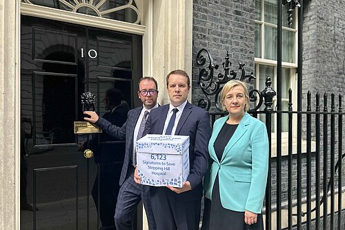 Tom Morrison MP, Lisa Smart MP and Cllr Mark Roberts delivering the petition to Downing St