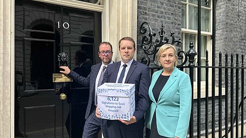 Tom Morrison MP, Lisa Smart MP and Cllr Mark Roberts delivering the petition to Downing St