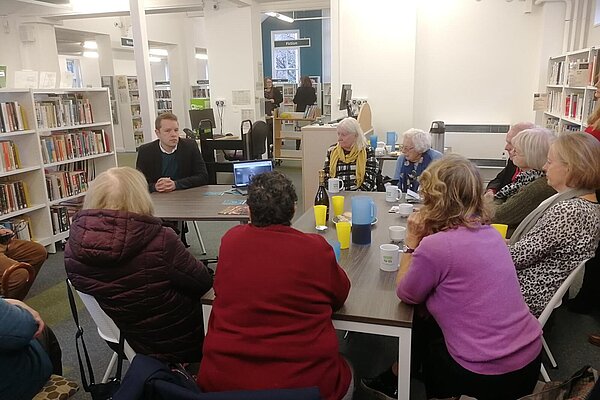 Tom meeting local residents about the new banking hub 