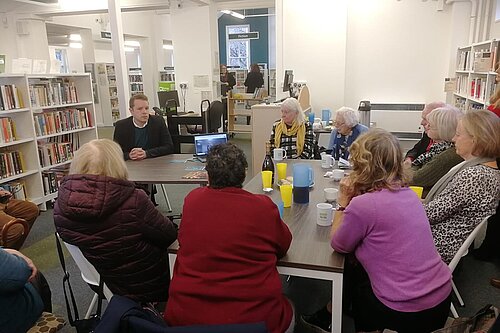 Tom meeting local residents about the new banking hub